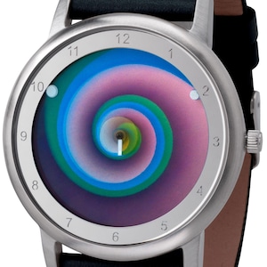 May include: A silver-tone wristwatch with a black leather band. The watch face features a colorful spiral design in shades of blue, green, and pink. The watch has a classic round shape.