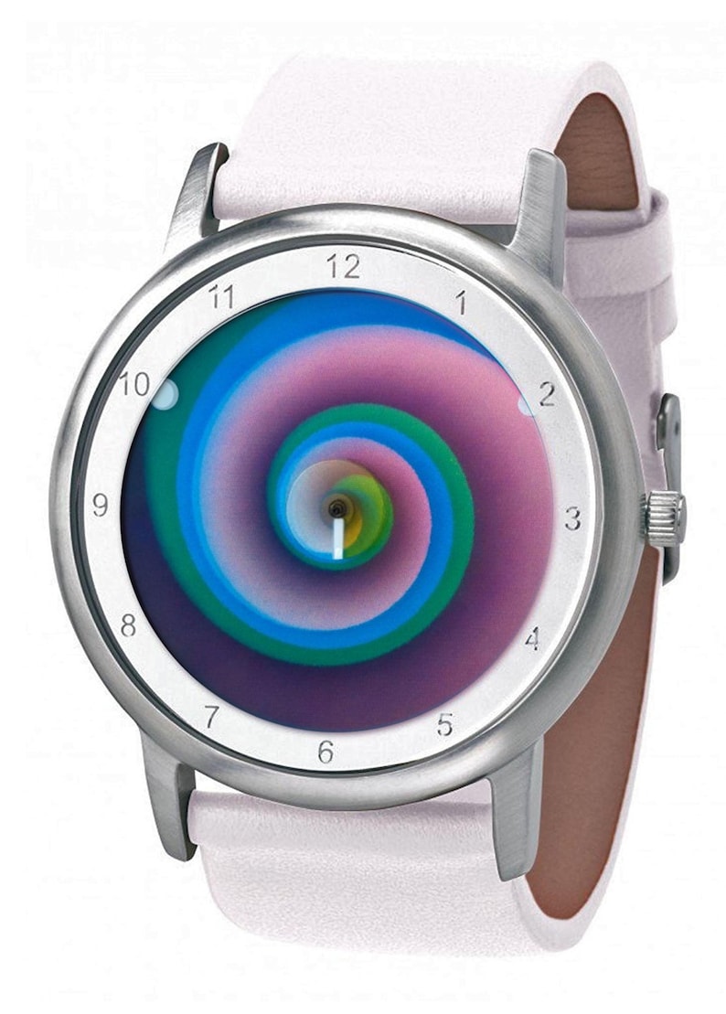 May include: A silver-toned wristwatch with a white leather band. The watch face features a colorful spiral design in shades of blue, green, and purple. The watch has a classic round shape with a white dial and black numerals.