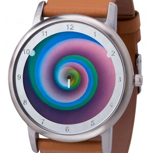 May include: A wristwatch with a stainless steel case and a brown leather band. The watch face features a colorful spiral design in shades of blue, green, and pink. The watch has white numerals and hands.
