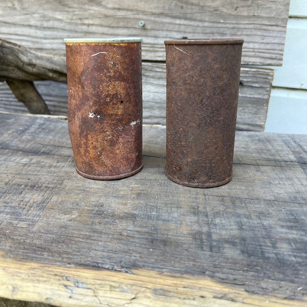 Two rusty cans