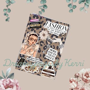 May include: A decorative leopard print case with fashion-themed stickers, including text that reads "Fashion is the most powerful art in the world." The case features illustrations of a woman, flowers, and designer logos.