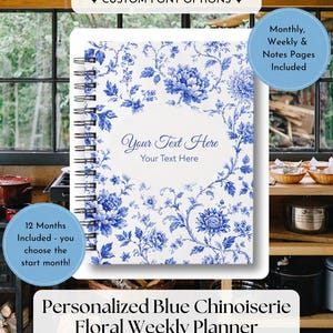 May include: A spiral-bound planner featuring a white cover with a blue floral pattern and a central white oval containing the text Your Text Here. The planner includes monthly, weekly, and notes pages, covering 12 months with a customisable start date.