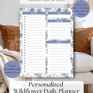 May include: A daily planner sheet featuring a blue wildflower border pattern. The layout includes sections labeled To Do, Date, Important, and Notes with lined spaces and checkboxes. Text on the page includes CUSTOM FONT OPTIONS, To-Do Lists, Date, Important Reminders & Notes, and 3 Sizes Available with multiple fonts.