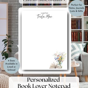 May include: A white rectangular notepad featuring the text a note from Trula Mae at the top center. The bottom right corner displays a watercolor illustration of an open book next to a glass jar filled with a colorful bouquet of wildflowers.
