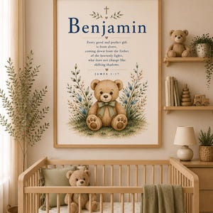 May include: A framed wall print featuring the name Benjamin, a Bible verse from James 1:17, and a central illustration of a brown teddy bear with a green bow, surrounded by green foliage and a small cross icon at the top of the design.