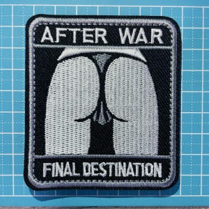 May include: Embroidered patch with the text "AFTER WAR" at the top and "FINAL DESTINATION" at the bottom. The patch features a stylized, grayscale image of a posterior. The patch has a black background with a gray border.