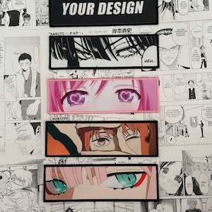 May include: A collection of five rectangular patches featuring anime-style eye illustrations. The top patch is black with the white text "YOUR DESIGN". Below are four patches displaying detailed close-ups of various character eyes with distinct colours.