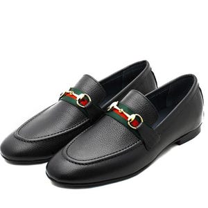 May include: A pair of black leather loafers with a rounded toe. Each shoe features a green and red striped band with a gold-colored metal buckle. The shoes are displayed on a white background.