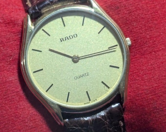 希少な最薄型ヴィンテージ ラドー クォーツ 121.5336.2 ゴールドメッキ ゴールドダイヤル 33mm 1980年代 スイス製