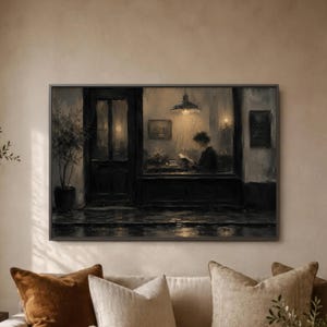 Rainy Cafe Window Wall Art Print, Woman Reading Book Poster, Warm Lamp Street Scene, Moody Coffee Shop Scene, Home Library Room Decor image 1
