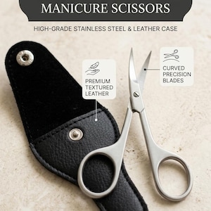 May include: Professional curved manicure scissors with curved precision blades. The scissors are made of high-grade stainless steel and come with a black premium textured leather case. The text on the image says "Professional Curved Manicure Scissors".
