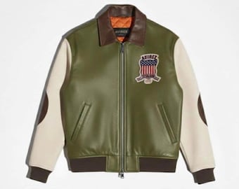 Chaqueta bomber de piel Avirex: Piel de vacuno auténtica, logotipo Gold Club bordado, diseño perforado.