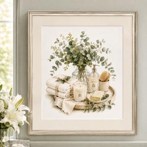 May include: A framed wall art print featuring a watercolor illustration of a spa-themed arrangement. The scene includes a glass vase with eucalyptus branches, a stack of white towels, a candle, a soap dispenser, a bar of soap, and a brush.