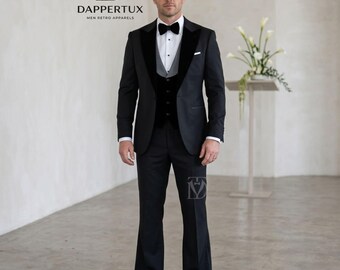 May include: A black three-piece tuxedo featuring a jacket with velvet lapels, a grey waistcoat, and matching trousers. The ensemble includes a white dress shirt, a black bow tie, and dark sunglasses. The text DAPPERTUX MEN RETRO APPARELS is visible.