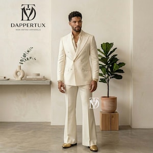 May include: A cream-colored double-breasted suit with wide-leg pants. The suit is worn with a gold chain and gold shoes. The image includes the text "DAPPERTUX MEN RETRO APPARELS".