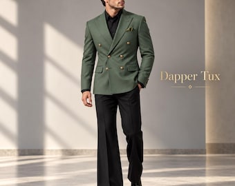 May include: A double-breasted olive green blazer with gold buttons, a black shirt, and black trousers. The text Dapper Tux is visible on the right side. The ensemble features a pocket square in the breast pocket and black dress shoes.