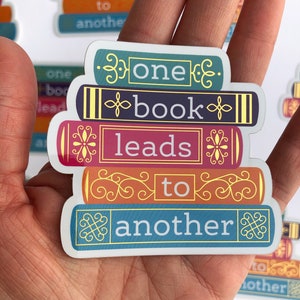 One Book Leads To Another Sticker | Stack of Books Bookish Decal for Book Lover Librarian Book Cart Bookworm Author | Nerd Gold Bibliophile