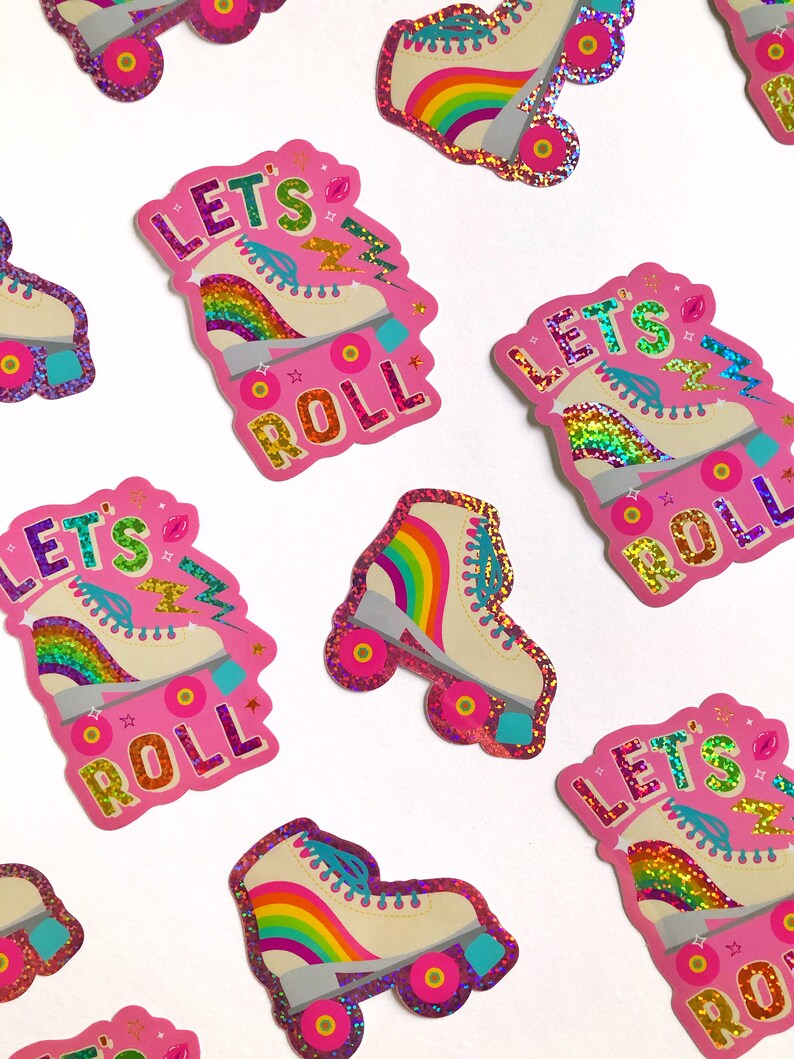 May include: Pink and white roller skate stickers with rainbow accents and the text "Let's Roll".