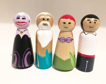 4 paquetes de 2 Disney La Sirenita. Príncipe Eric, Ariel, Rey Tritón, Ursula peg personas juguete