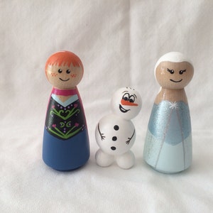 Disney Frozen&#39;s Queen Elsa and Princess Anna of Arendelle plus Olaf hand painted wooden peg dolls