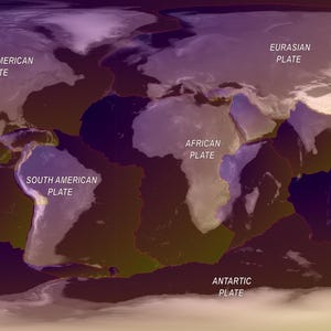 May include: A world map showing the Earth's tectonic plates. The map is labeled with the names of the major plates, including the Pacific, North American, South American, African, Eurasian, Indo-Australian, and Antarctic plates. The map uses a color gradient.