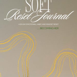May include: A journal with the title "SOFT Reset Journal" in white script. The journal cover is a light gray with gold abstract lines. Text below reads "A 30-DAY EMOTIONAL, HABIT, AND MINDSET RESET" and "...BECOMING HER."