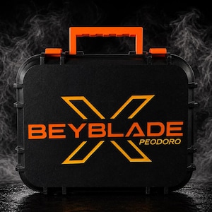May include: Black carrying case with orange handle and accents. The case features the text "BEYBLADE X PEODORO" in orange and yellow. The case has a rectangular shape with rounded corners.
