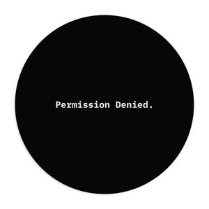 May include: A circular black mouse pad featuring the white text Permission Denied. centered in the middle. The design uses a clean, sans-serif font against a solid dark background, creating a high-contrast look for this computer accessory.