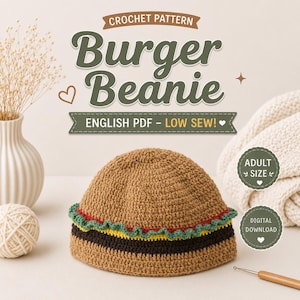 May include: A crochet pattern for a Burger Beanie, an adult-sized hat designed to look like a hamburger. The beanie features a tan crown, a dark brown base, a yellow cheese layer, and a ruffled green lettuce trim. Text reads: CROCHET PATTERN Burger Beanie ENGLISH PDF - LOW SEW! ADULT SIZE DIGITAL DOWNLOAD.
