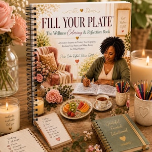 May include: A spiral-bound wellness coloring and reflection book titled FILL YOUR PLATE. The cover features an illustration of a person coloring at a table with fruit, flowers, and candles. The book includes prompts for peace, presence, and gratitude.
