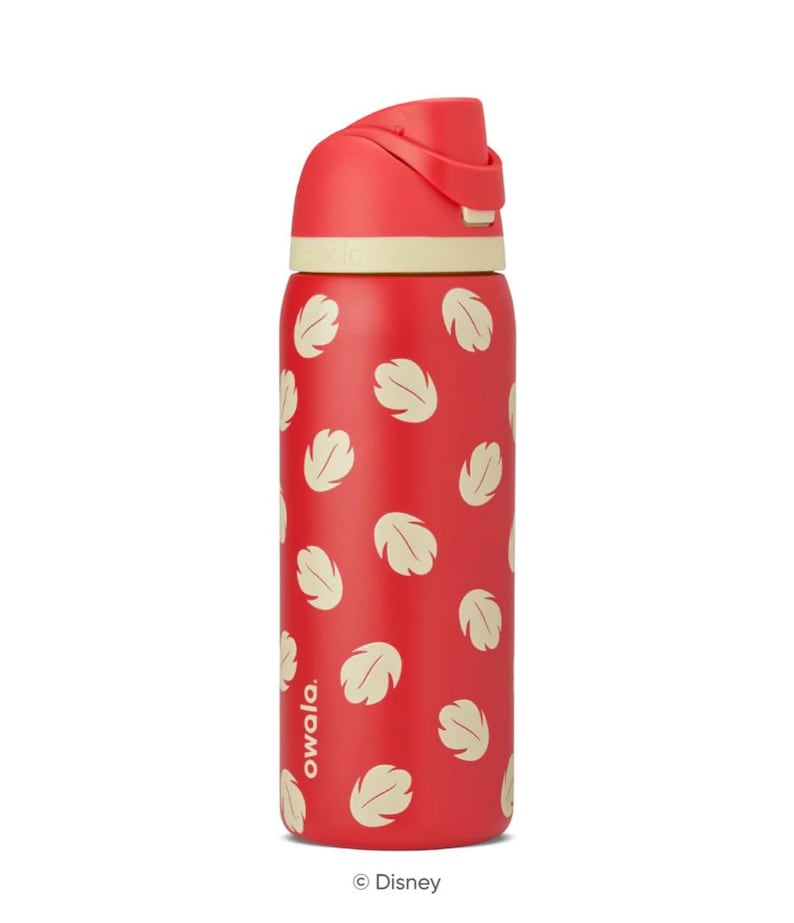 May include: Red water bottle with a flip-top lid and a pattern of cream-colored leaf shapes. The bottle has the brand name "owala" printed vertically on the side. The Disney logo is at the bottom.