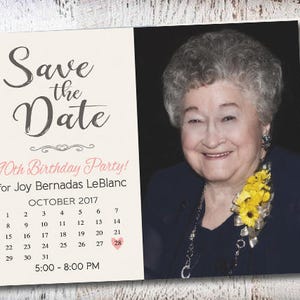 May include: Save the Date invitation for a 90th birthday party for Joy Bernadas LeBlanc. The invitation features a calendar with the date highlighted in pink and a photo of the birthday girl.