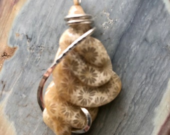 Fossilized Coral Carved Silver Pendant