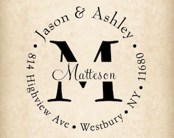 May include: Circular stamp design with the names "Jason & Ashley" arched at the top. The name "Matteson" is centered below a large letter "M". Address and location details are printed around the circle.