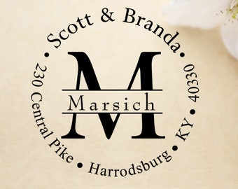 May include: A black and white round return address stamp with the text "Scott & Branda. 230 Central Pike • Harrodsburg • KY • 40330" and a large letter "M" with the name "Marsich" centered below the letter.