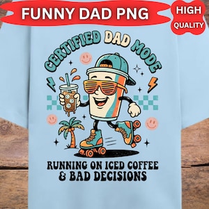 May include: Pale blue t-shirt featuring a cartoon coffee cup character on roller skates, wearing sunglasses. Text reads "CERTIFIED DAD MODE" and "RUNNING ON ICED COFFEE & BAD DECISIONS". The design includes lightning bolts, palm trees, and smiley faces.