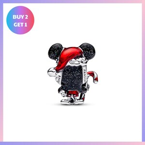 A silver and black charm in the shape of a cartoon character, possibly a character from Disney or a similar franchise, wearing a red hat and holding a red cane.