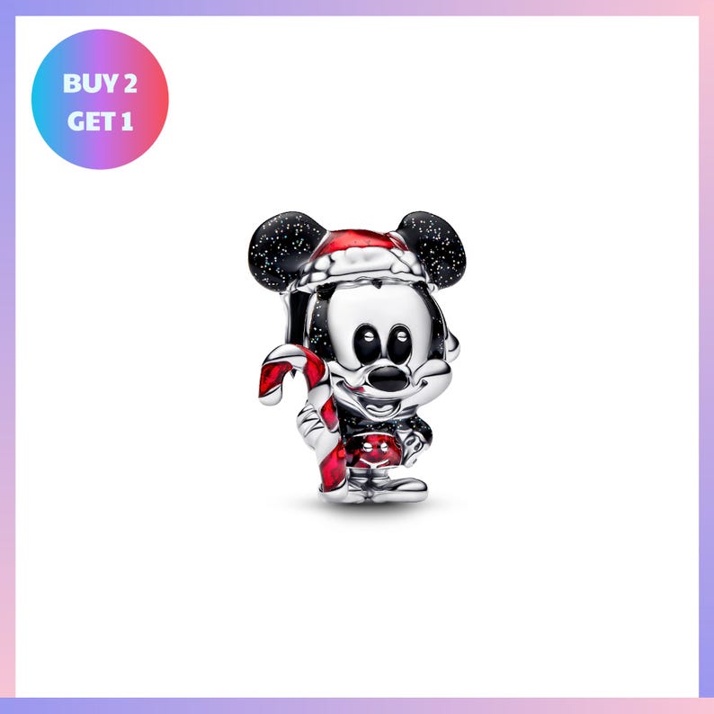 A silver charm in the shape of a cartoon character, resembling Mickey Mouse, is displayed against a white background.