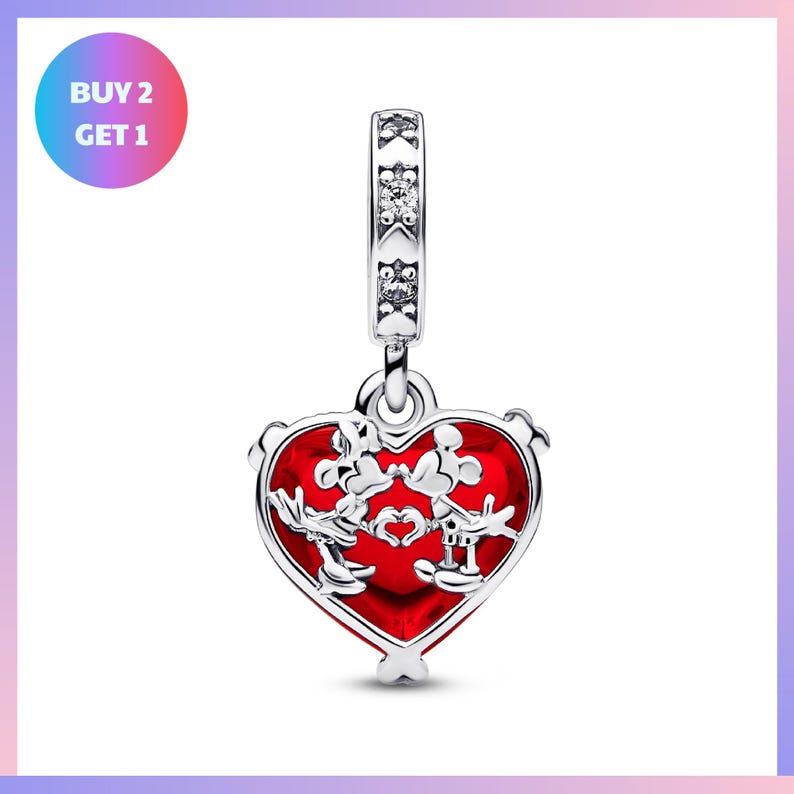 A heart-shaped charm with a red background and a silver frame, featuring a Disney character design.