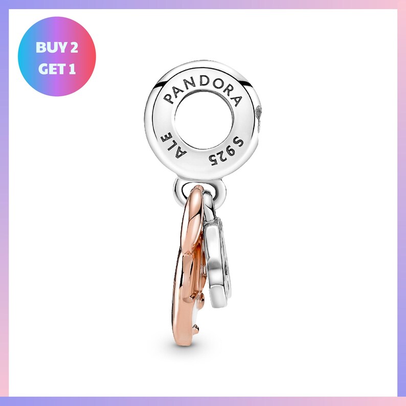 a silver-toned charm bracelet with a pendant, and there is a promotional offer for purchasing two charms.