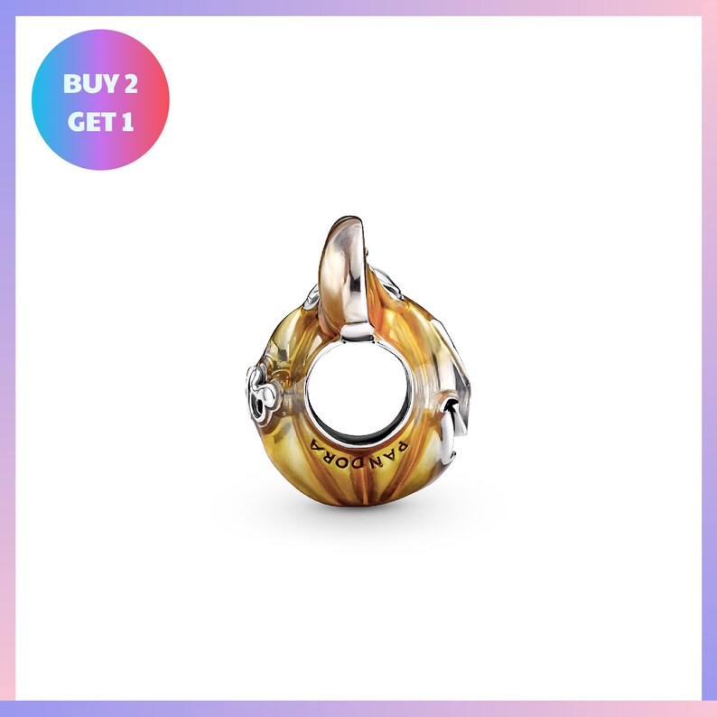 a round pendant with a floral design, and it is presented against a white background.