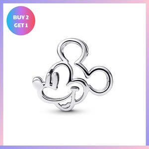 A silver-colored charm in the shape of a cartoon character, resembling Mickey Mouse, is displayed against a white background.