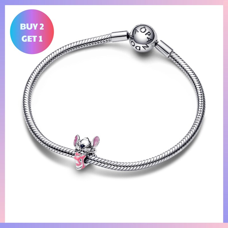 A silver-colored charm bracelet with a charm featuring a cartoon character and the text "PANDA" on it.
