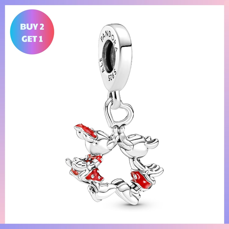 A silver charm bracelet with a panda bear design and a star-shaped clasp.
