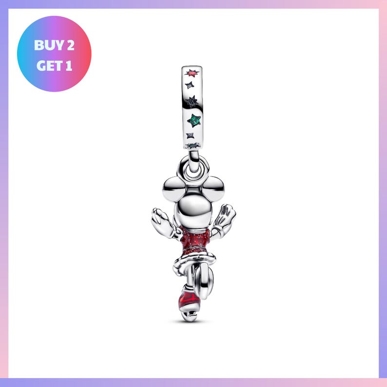 A silver charm in the shape of a cartoon character, possibly a Mickey Mouse, with red and green accents.