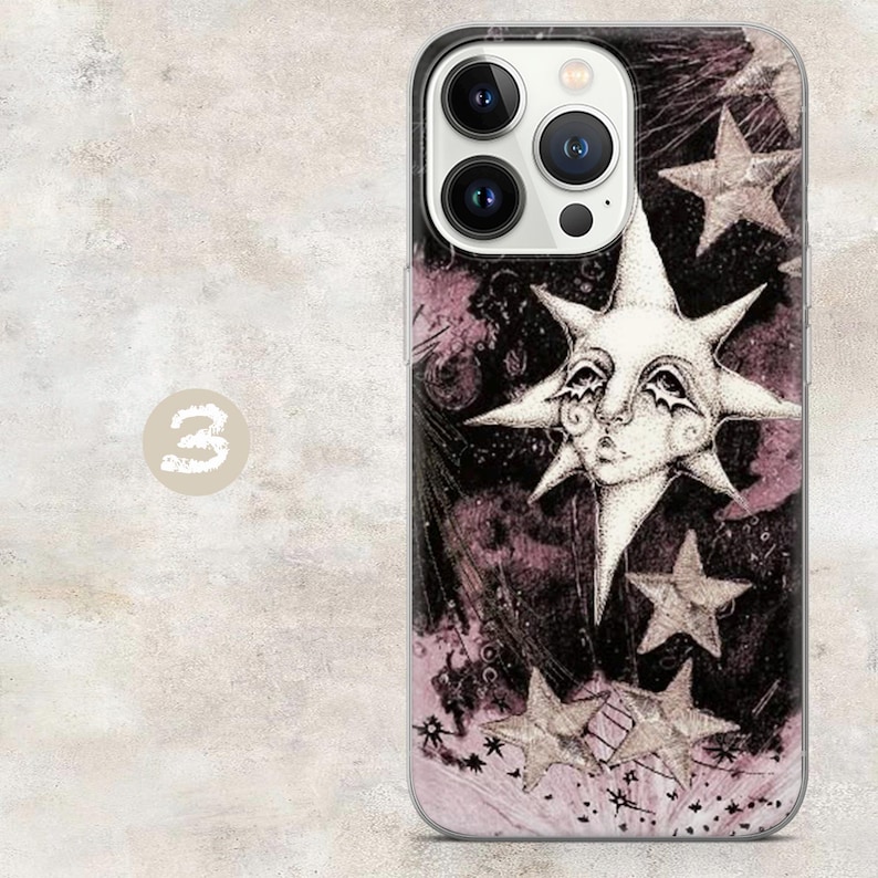 May include: A smartphone case featuring a dark purple and black background with a central white sun face illustration and multiple white stars. The design includes a prominent sun with facial features and rays, surrounded by various star shapes.