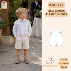 Könnte beinhalten: Ein digitales Schnittmuster für klassische Kinder-Falten-Shorts mit einer Strichzeichnung der Shorts, dem Text KIDS CLASSIC PLEATED SHORTS, 2Y-12Y, US LETTER, A0/A4 und einem PDF-Symbol. Das Schnittmuster enthält eine englische Anleitung.
