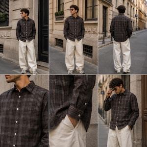 May include: A long-sleeve button-down shirt featuring a dark brown and grey plaid pattern with a standard collar and white buttons, paired with loose-fitting off-white trousers. The shirt has a single chest pocket and buttoned cuffs.