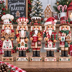 May include: Five decorative nutcracker figurines standing in a row, each wearing a festive holiday outfit and holding baking or Christmas-themed items. The bases feature text including Baked With Love, Sweet Holiday Treats, Warm Hearts Bright Days, Candy Cane Wishes, and Home For Christmas.