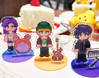 Figura acrílica y juguete con agitador de Sam Sebastián y Abigail de Stardew Valley.